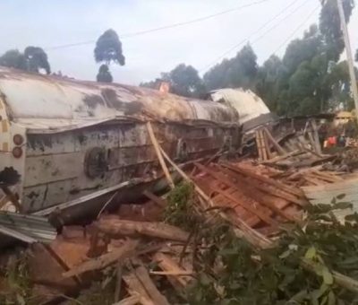Tanker rams into houses